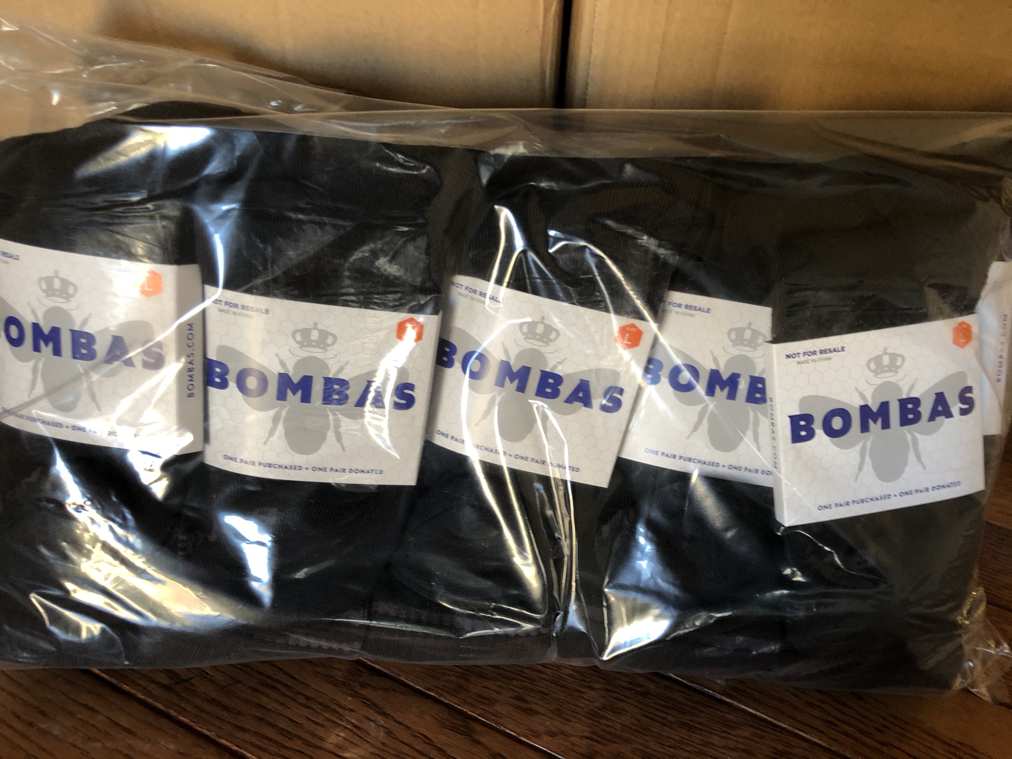 3,750 pairs of socks donated by Bombas Charity Crossing